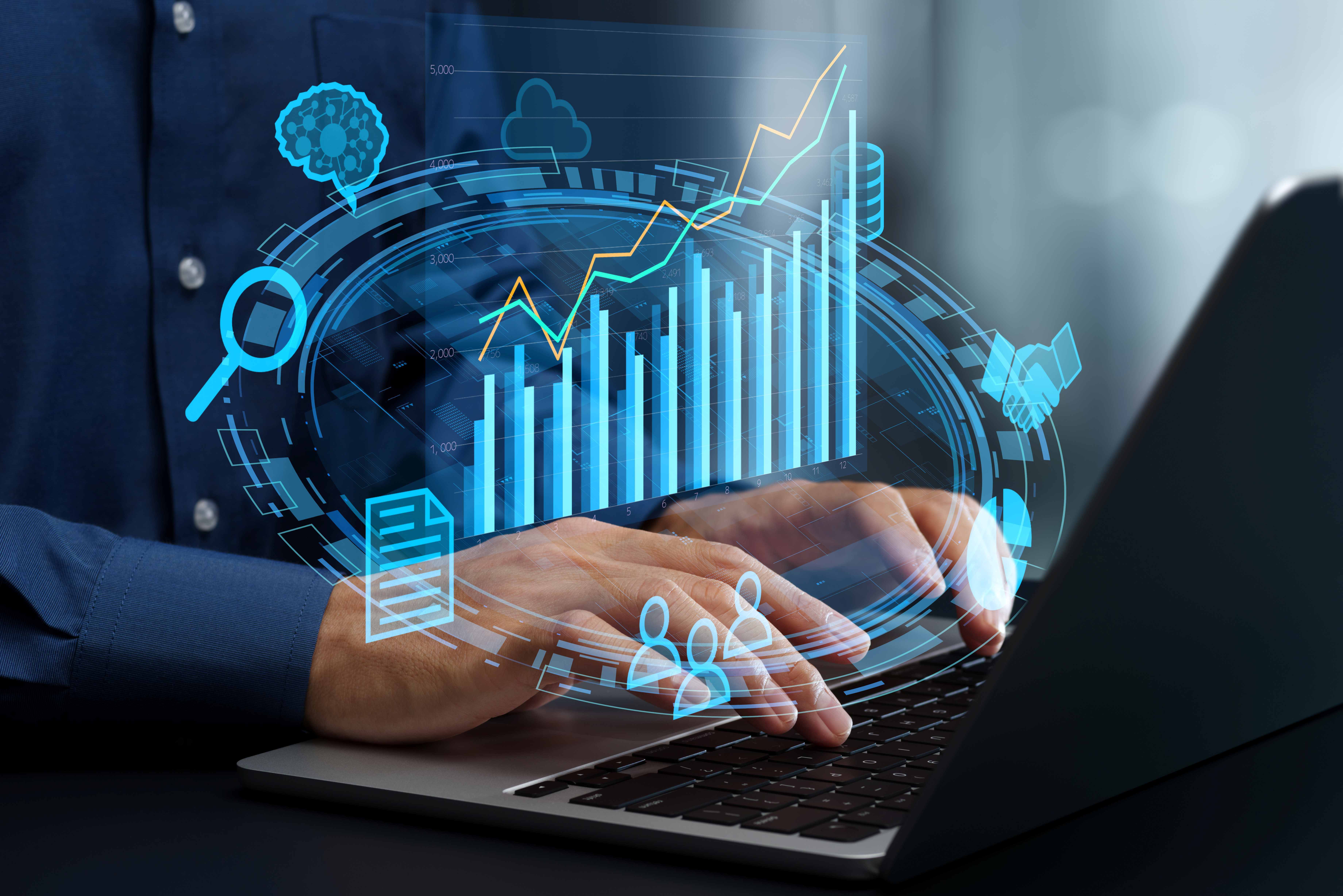 Business data analysis. Automated BI and KPI visualization solution. Data driven decision making. Businessman using laptop computer to view analytics
