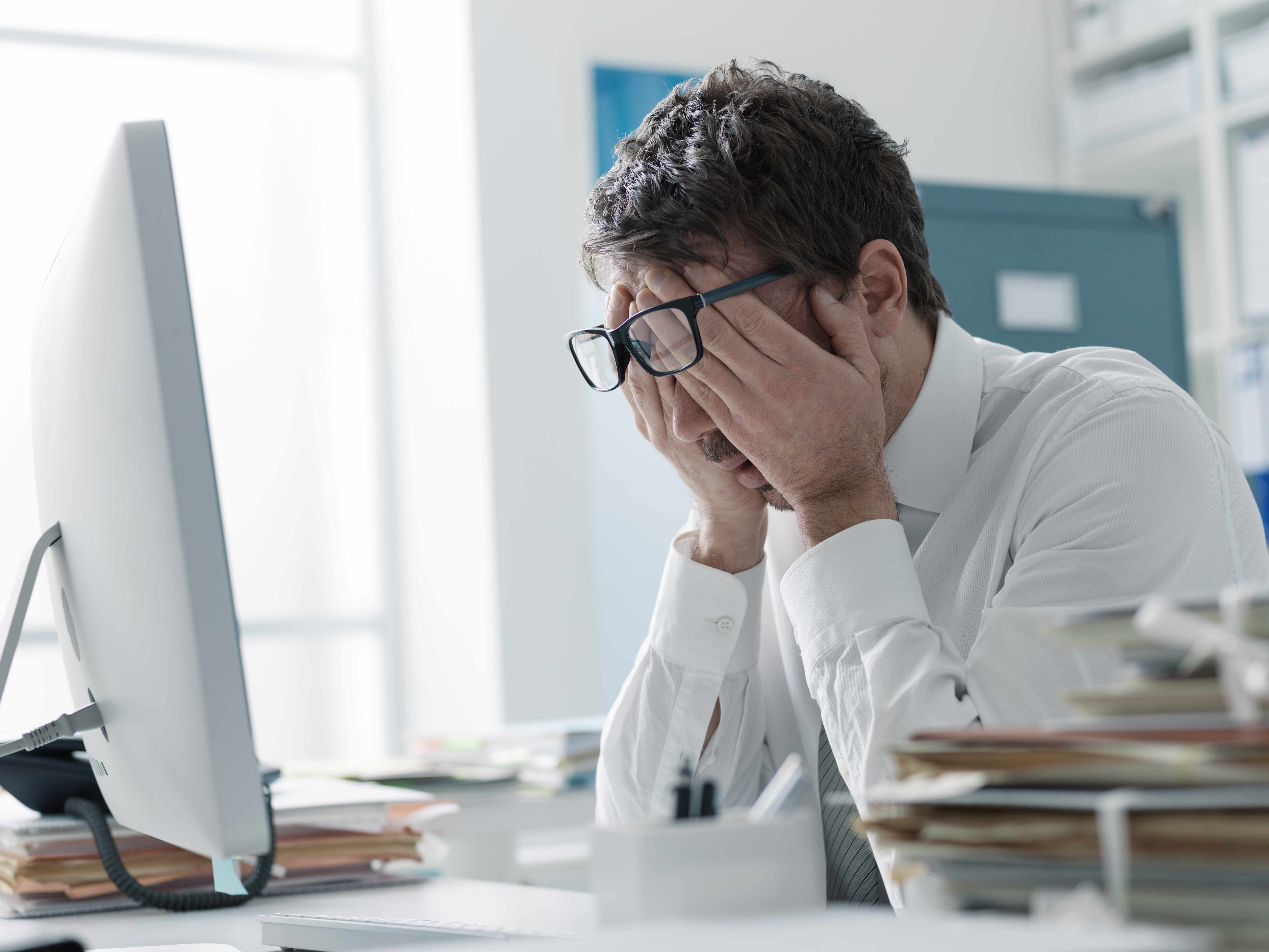 Developers troubleshooting issues with crashed website of company